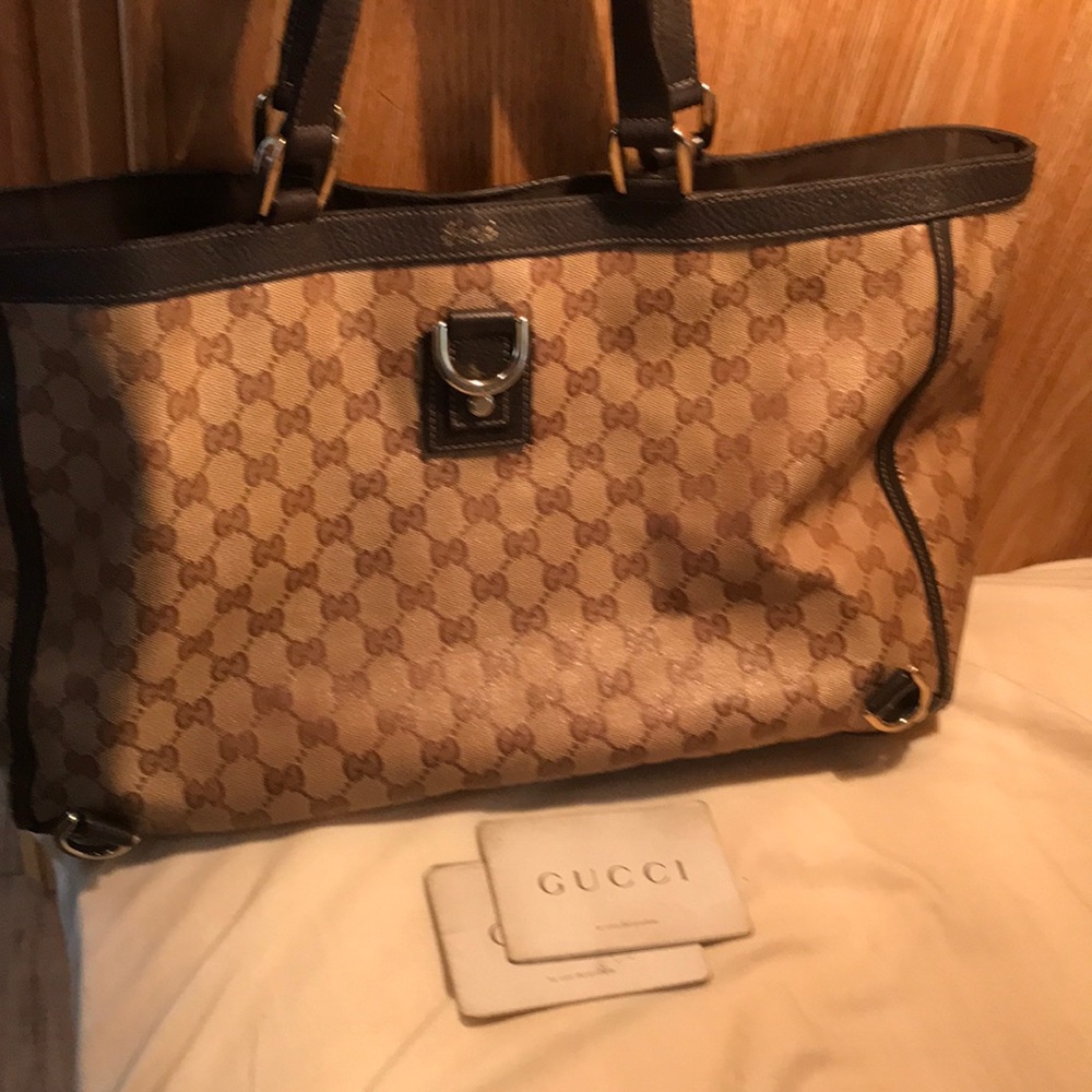 100% authentic Gucci coated canvas handbag